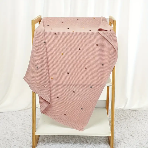 Strickdecke Babydecke gestrickt aus Baumwolle mit Pompon-Details Rosa